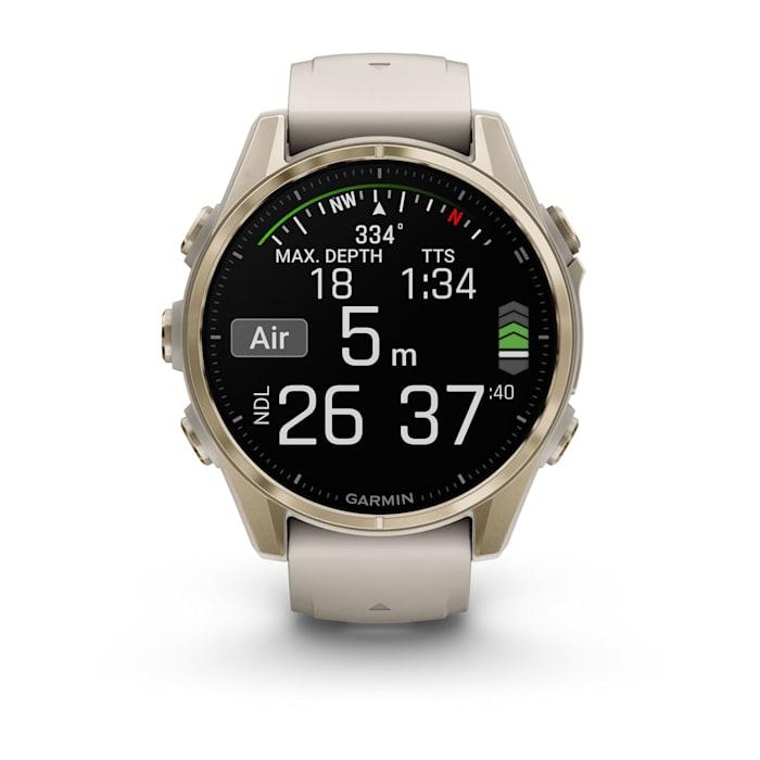 Fēnix® 8 - 43 mm, AMOLED, saphir, or doux avec bracelet en silicone gris brouillard/grès foncé