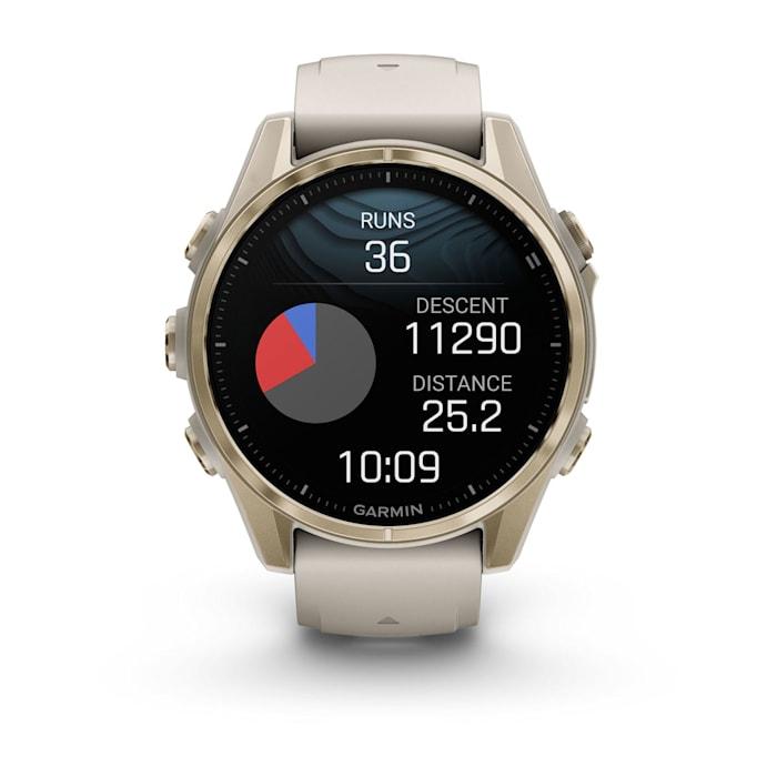 Fēnix® 8 - 43 mm, AMOLED, saphir, or doux avec bracelet en silicone gris brouillard/grès foncé