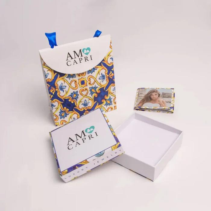Bracciale in Acciaio campana pendente con cristalli azzurri e bianchi