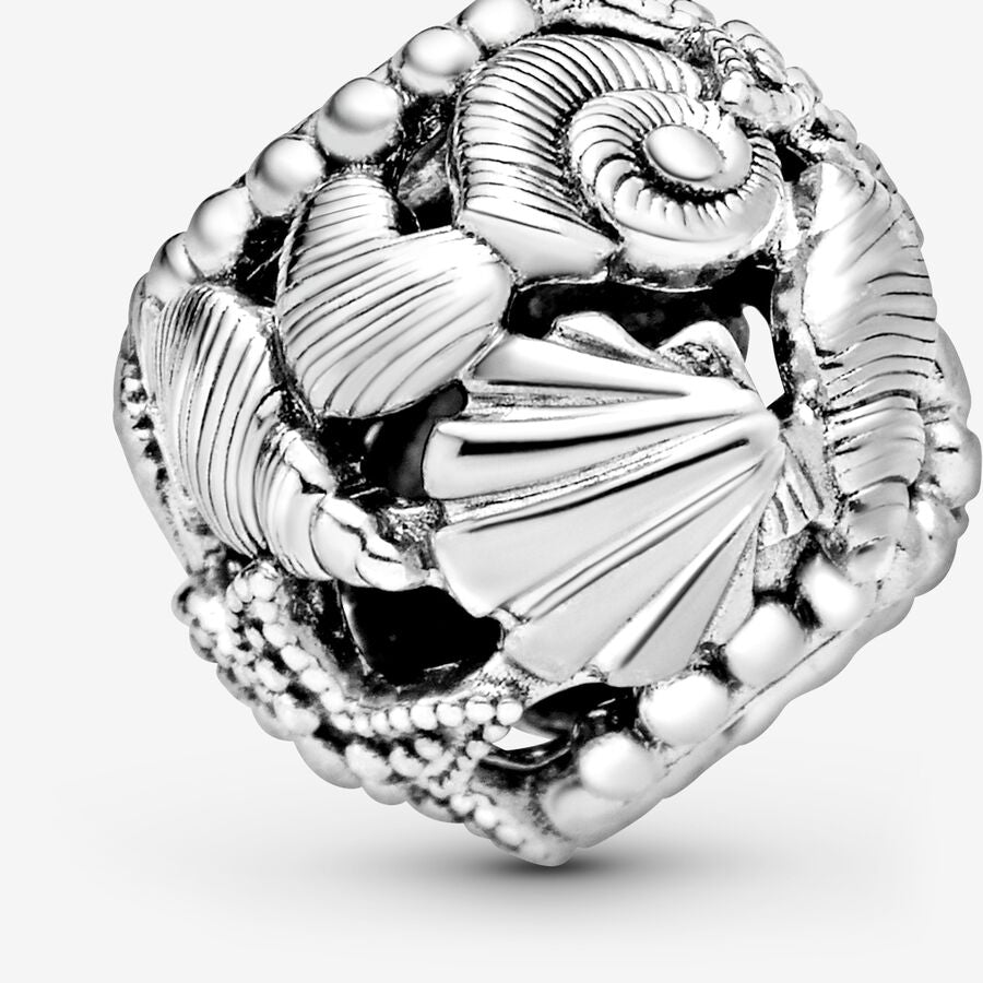 Breloque ajourée étoile de mer, coquillage et cœur