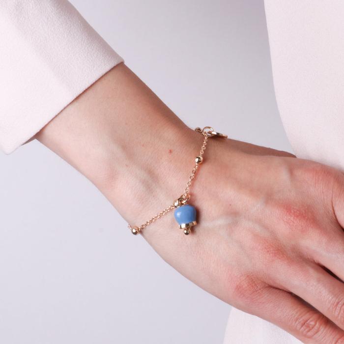 Metal bracelet with pendant lucky bell, embellished with enamel and light point