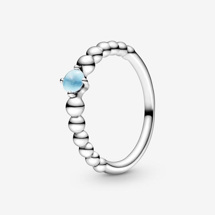 Bague en pierre bleue de décembre