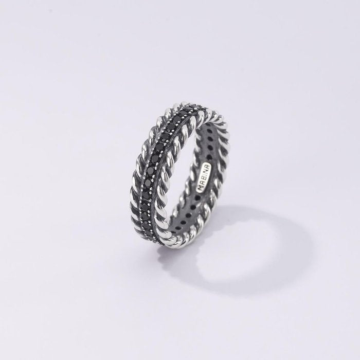 Bague Torchon et pierres noires