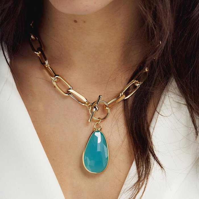 Collier en bronze plaqué or avec cristal turquoise