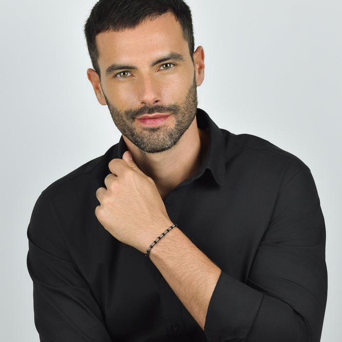 BRACELET HOMME EN ACIER AVEC ÉLÉMENTS ARGENTÉS ET PIERRES NOIRES