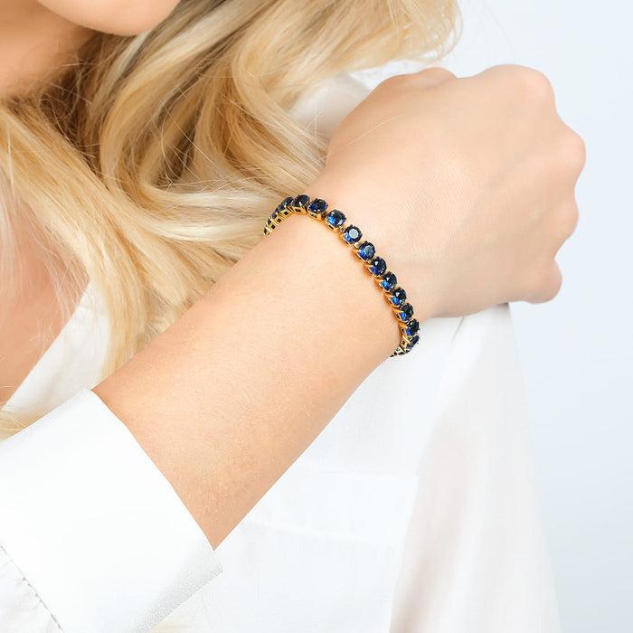 WOMEN'S TENNIS BRACELET IN IP GOLD STEEL WITH BLUE CRYSTALS
