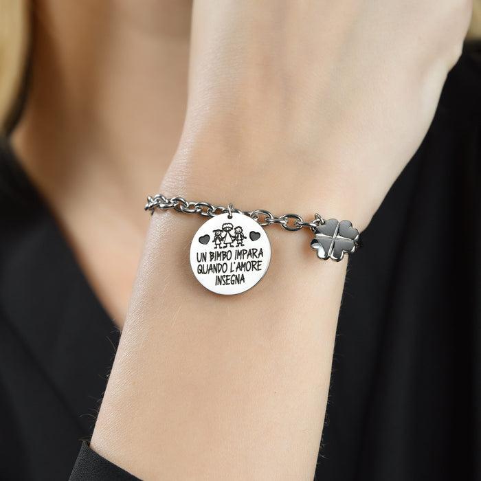 BRACELET EN ACIER POUR FEMME UN ENFANT APPREND QUAND L'AMOUR ENSEIGNE