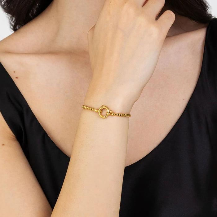 BRACELET FEMME EN ACIER DORÉ AVEC CERCLE
