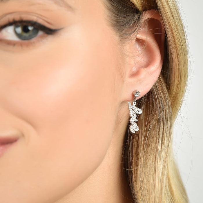 BOUCLES D'OREILLES EN ACIER POUR FEMME AVEC ÉCRITURE D'AMOUR ET CRISTAUX BLANCS