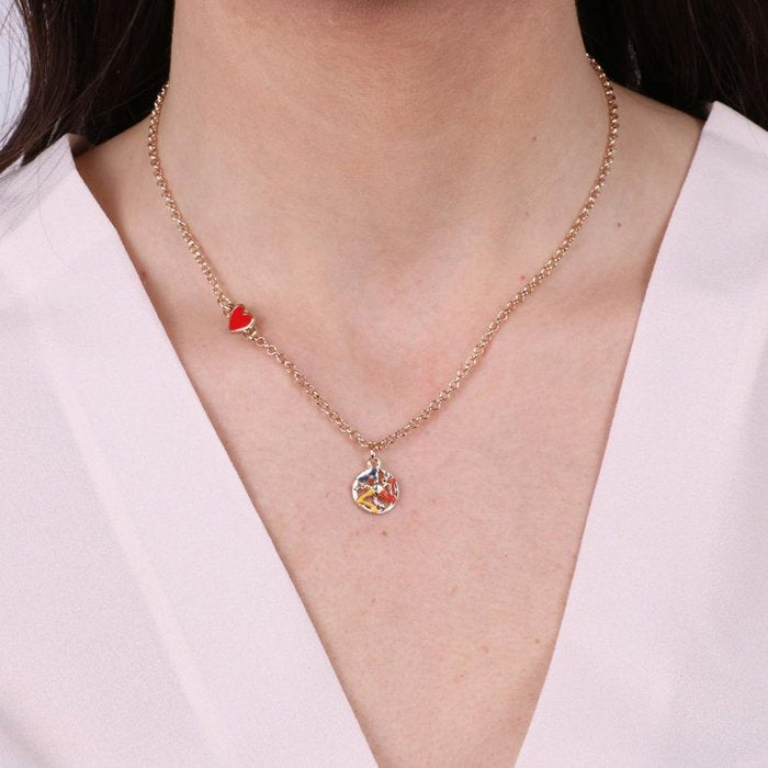 Metal necklace with heart and trinacria pendant