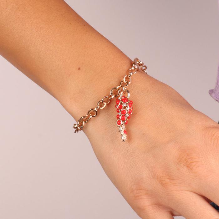 Metal bracelet with central horn and crystals