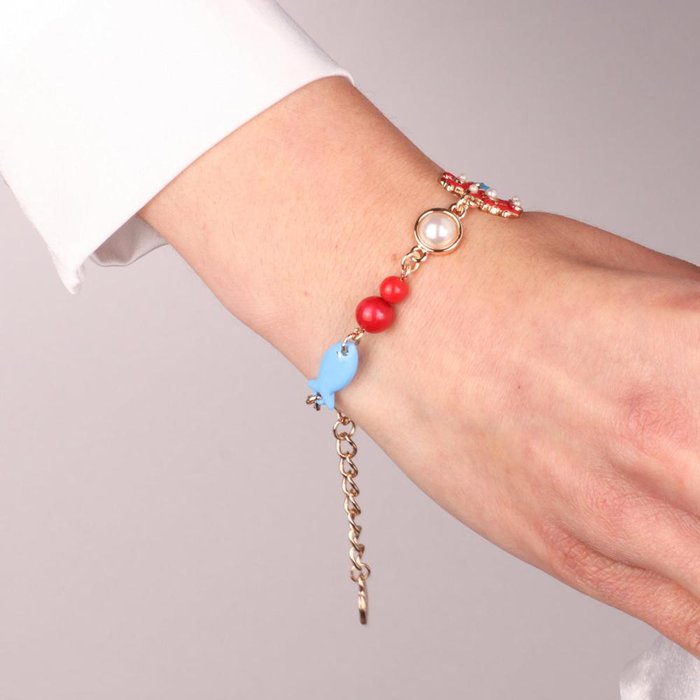 Bracelet en métal avec symboles marins