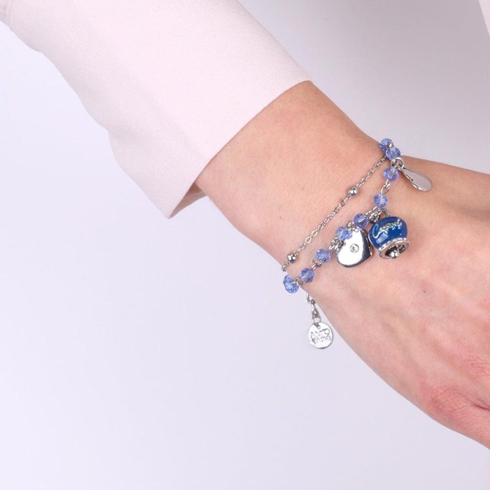 Metal bracelet with blue enamel bell and hanging hearts