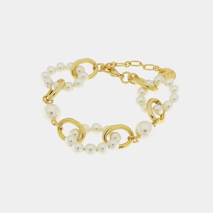 Bracelet en métal avec perles circulaires entrelacées
