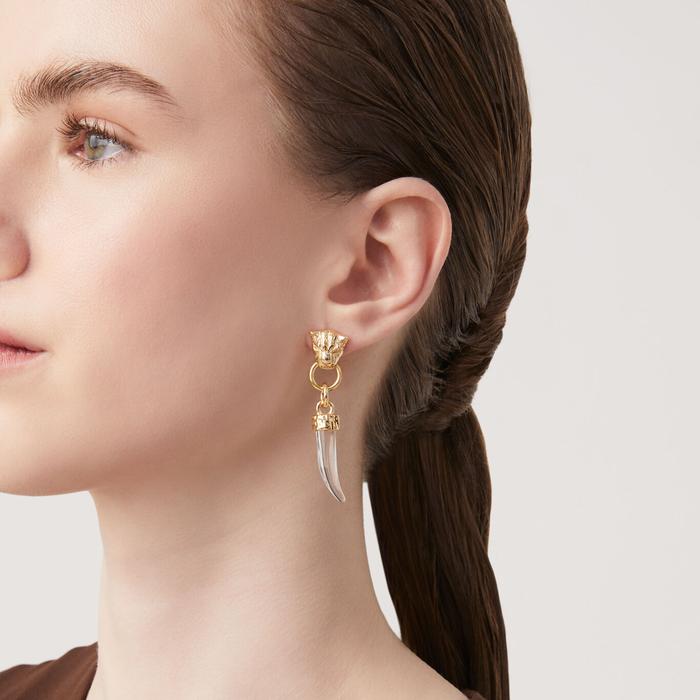 Boucles d'oreilles en or léopard et défense