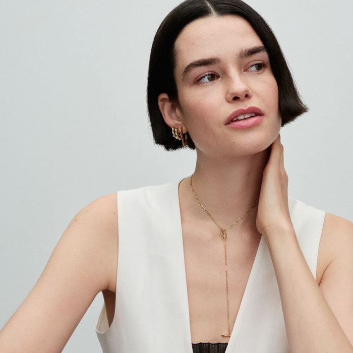 Boucles d'oreilles créoles ouvertes en V à ligne sinueuse