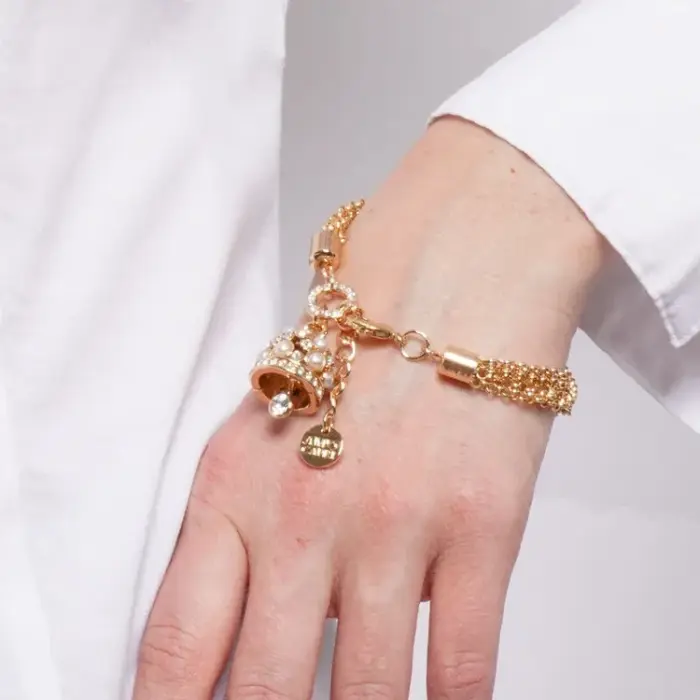 Bracciale in Metallo con campanella portafortuna dorata e perline