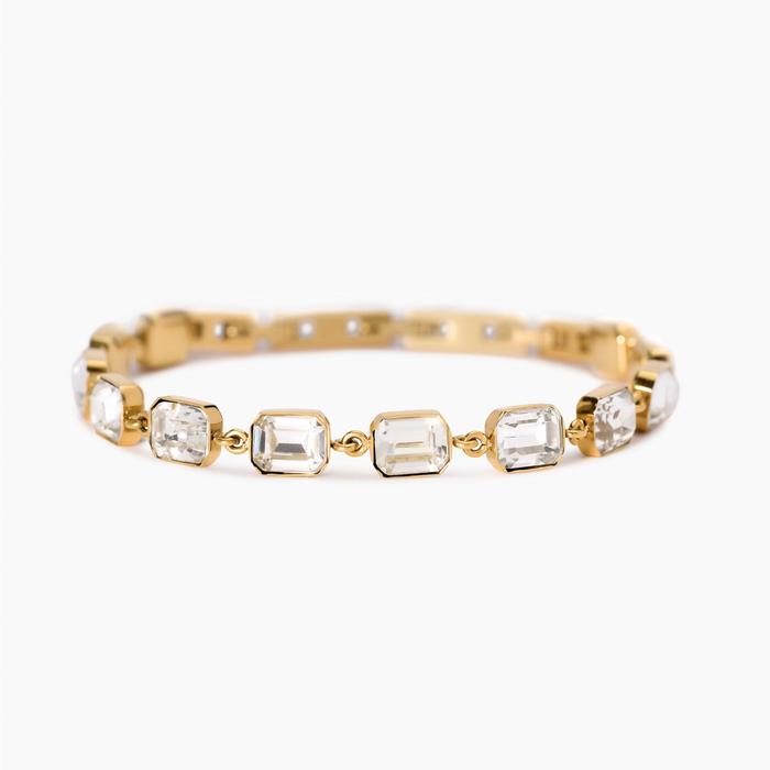 Golden bracelet with white crystals