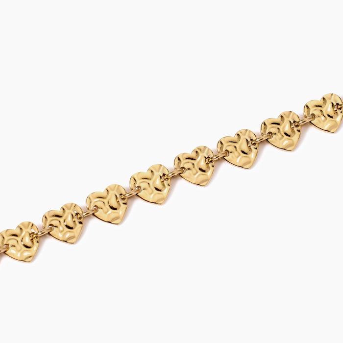 Bracelet doré avec coeurs effet martelé