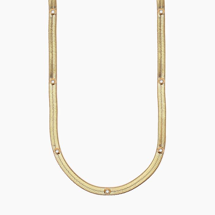 Golden choker with white crystals