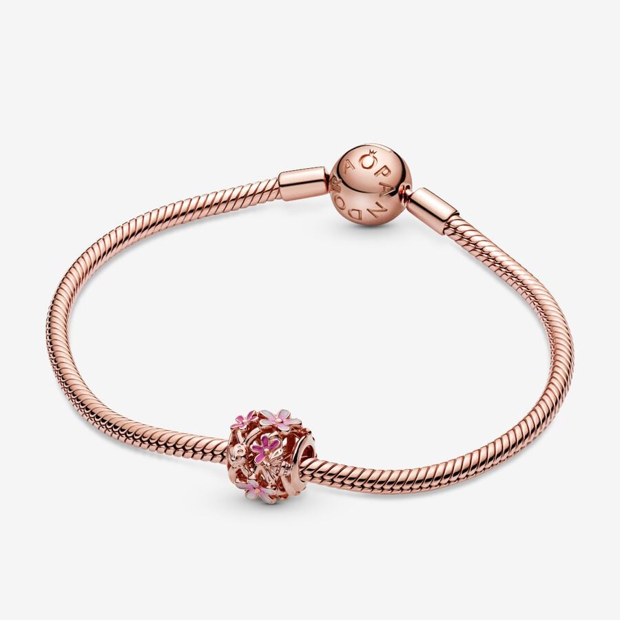 Breloque ajourée marguerite rose
