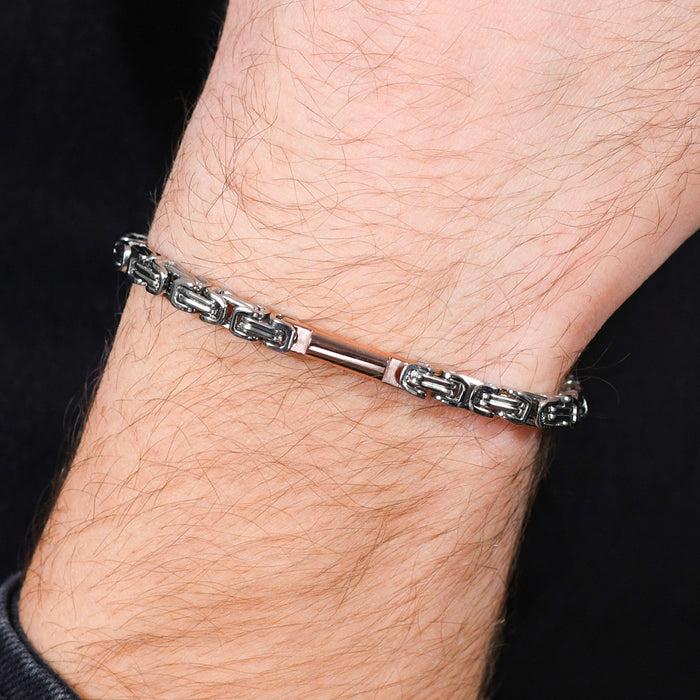 BRACELET HOMME EN ACIER AVEC ÉLÉMENT IP ROSE