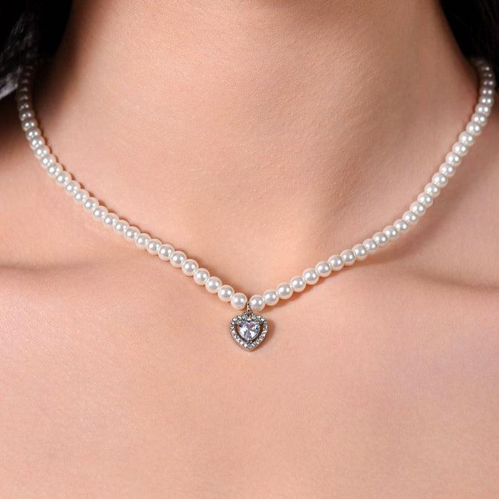 COLLIER FEMME EN ACIER AVEC PERLES ET COEUR AVEC ZIRCON BLANC