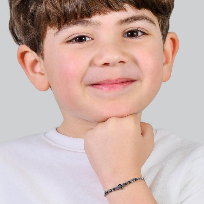 BRACELET ENFANT EN ACIER AVEC HÉMATITE GRISE ET GOUVERNAIL