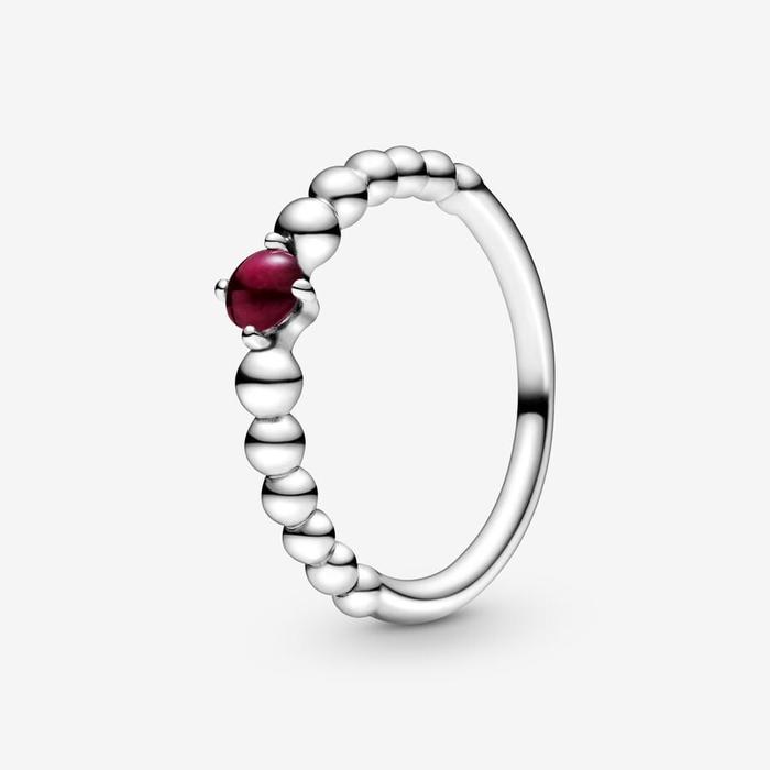 Bague en pierre rouge foncé janvier