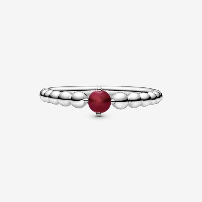 Bague en pierre rouge foncé janvier