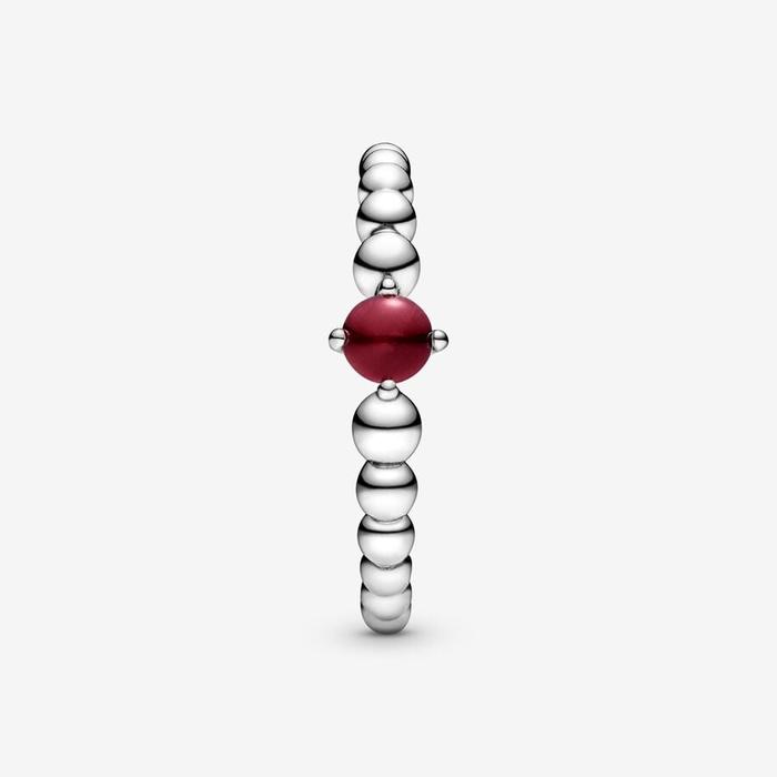Bague en pierre rouge foncé janvier