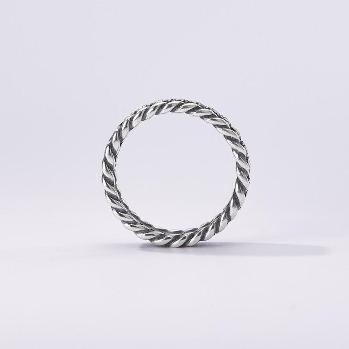 Bague Torchon et pierres noires