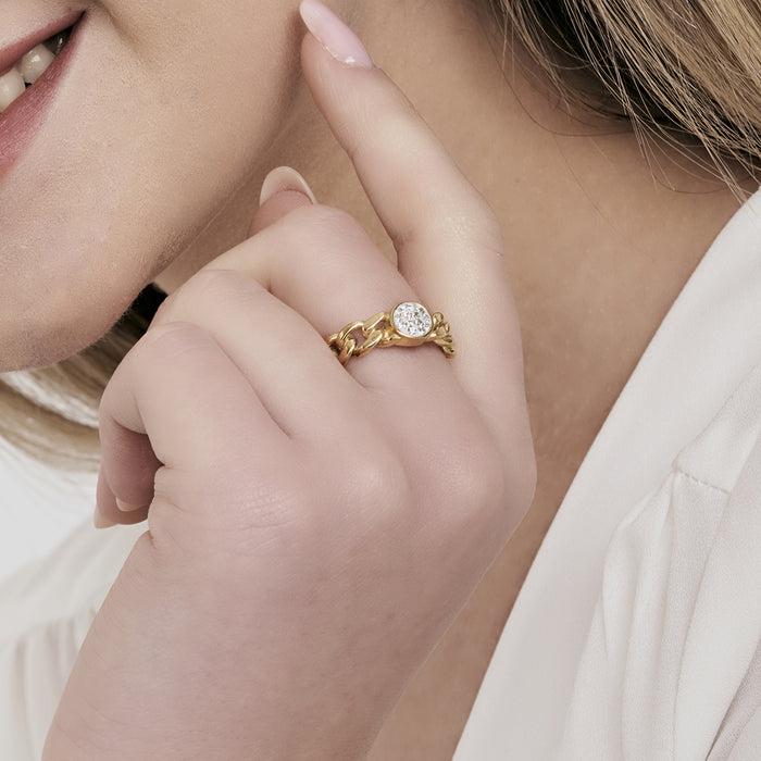 BAGUE FEMME EN ACIER DORÉ IP AVEC CRISTAUX BLANCS