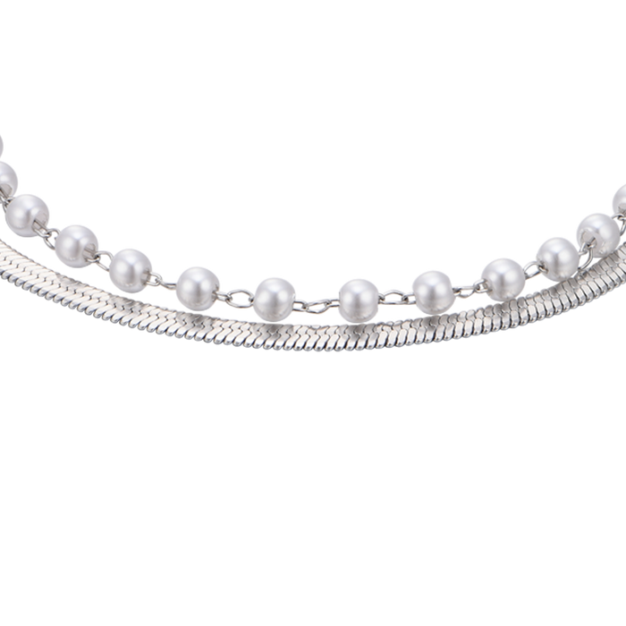 WOMEN'S STEEL BRACELET WITH WHITE PEARLS
