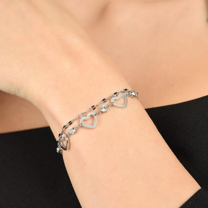WOMEN'S MULTI-STRING BRACELET IN STEEL WITH OPENWORK HEARTS AND WHITE CRYSTALS