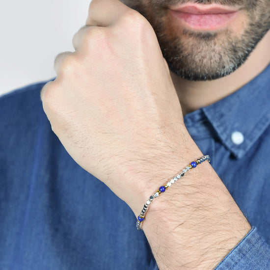 MEN'S BRACELET IN STEEL WITH BLUE STONES AND IP GOLD ELEMENTS