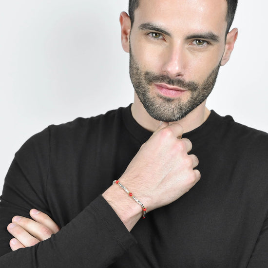 MEN'S BRACELET IN STEEL WITH RED STONES AND IP GOLD ELEMENTS