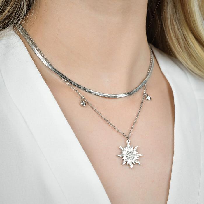 COLLIER FEMME EN ACIER AVEC SOLEIL ET CRISTAUX BLANCS