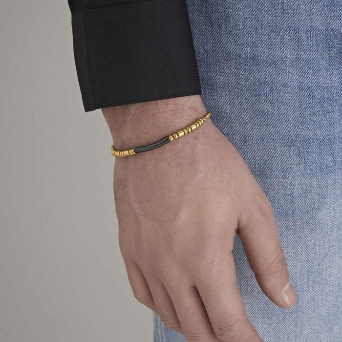 Bracelet en acier doré IP avec élément IP noir