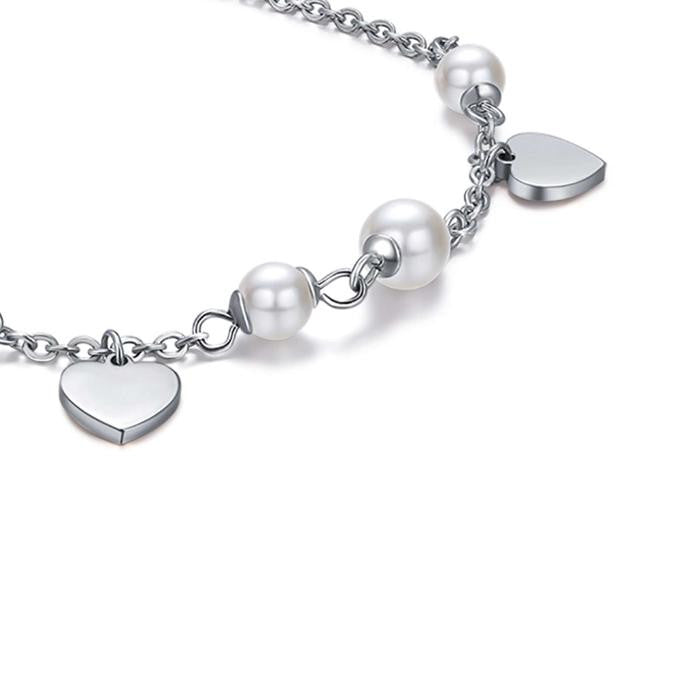 Bracelet en acier avec perles blanches et cœurs
