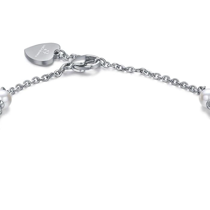Bracelet en acier avec perles blanches et cœurs