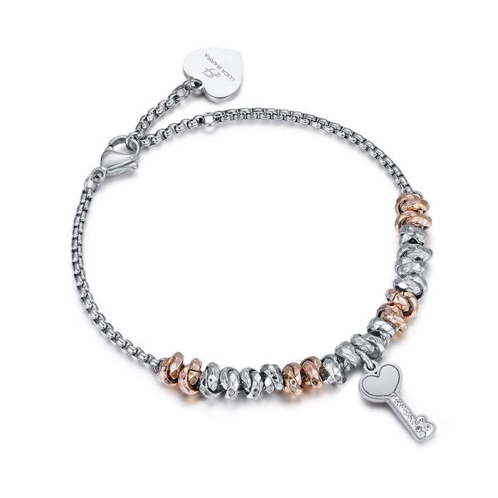 Bracelet en acier avec éléments IP Key Rose et cristaux blancs