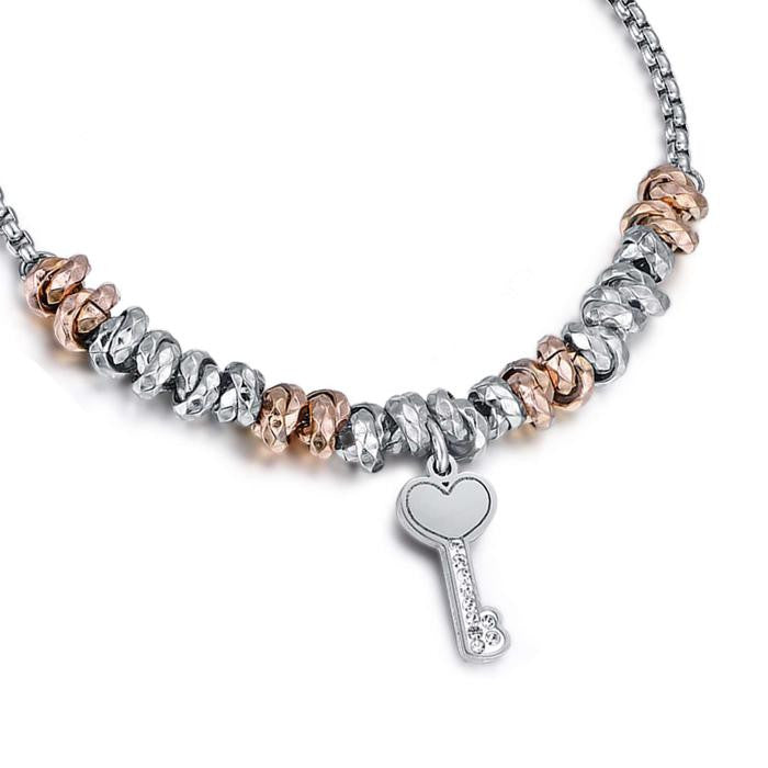 Bracelet en acier avec éléments IP Key Rose et cristaux blancs
