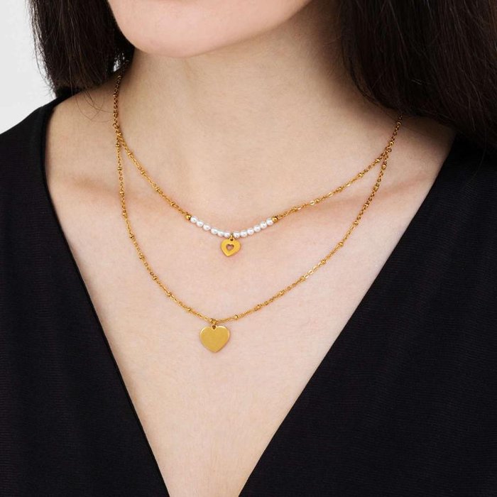 IP gold steel necklace with hearts and white pearls
