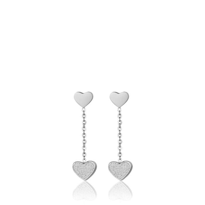 Boucles d'oreilles en acier avec cœurs à paillettes blanches
