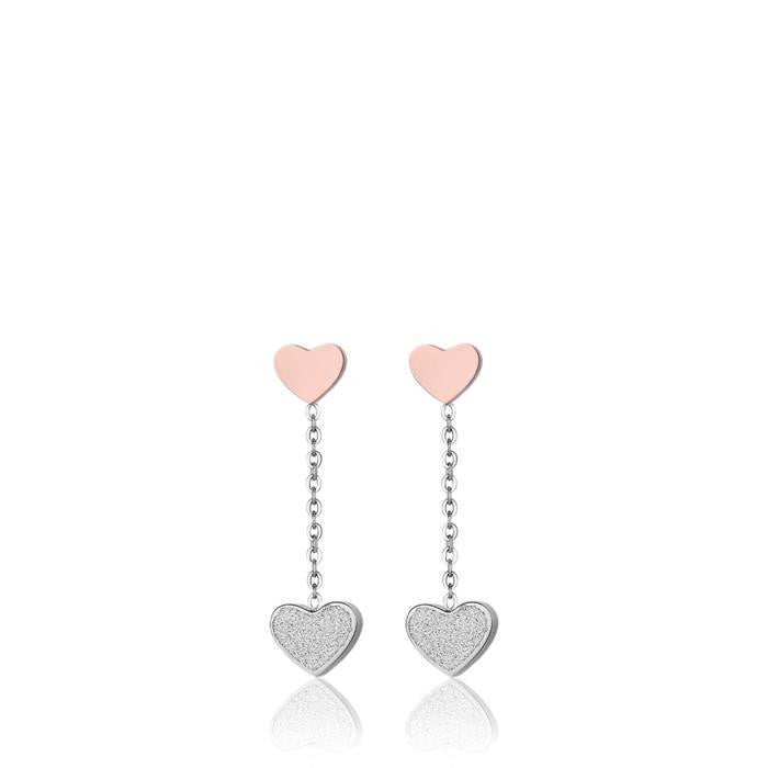 Boucles d'oreilles en acier avec cœurs en acier IP rose et paillettes blanches