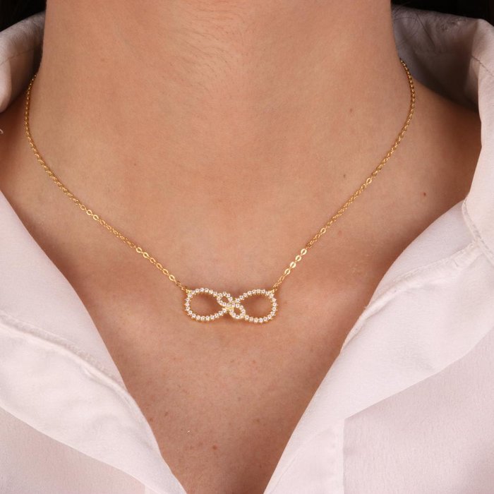 Collier en argent 925 avec symbole de l'infini orné de zircons blancs