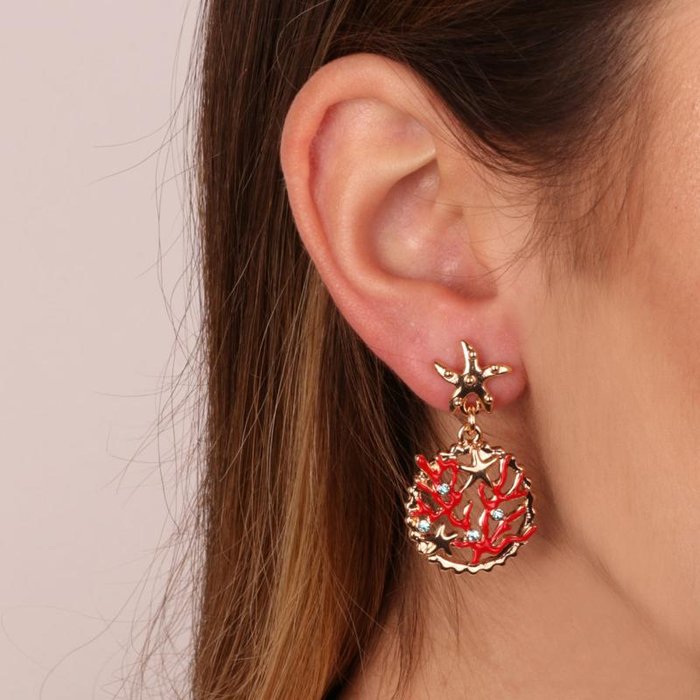 Metal earrings with corals