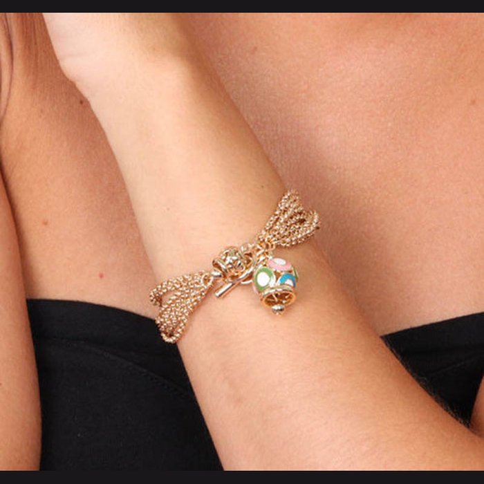 Metal bracelet with colored bell and heart-shaped bell