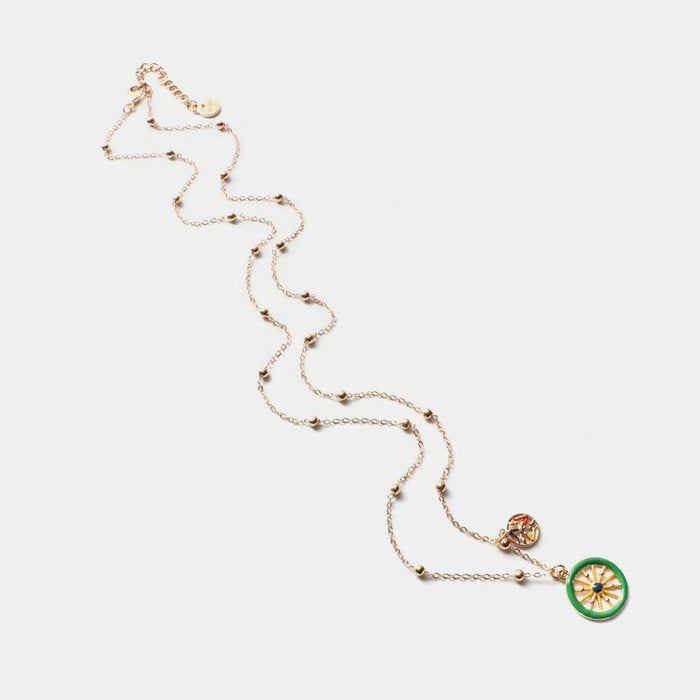 Collier en métal avec roue de charrette sicilienne et symbole de Trinacria orné d'émaux colorés